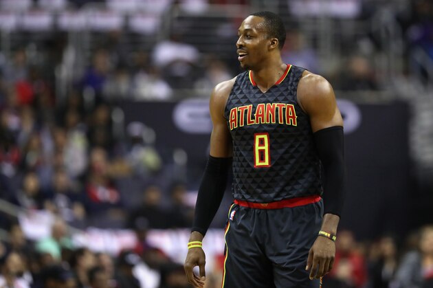 WASHINGTON, DC - APRIL 19: Dwight Howard #8 of the Atlanta Hawks looks on against the Washington Wizards in the first half of Game Two of the Eastern Conference Quarterfinals during the 2017 NBA Playoffs at Verizon Center on April 19, 2017 in Washington, DC. NOTE TO USER: User expressly acknowledges and agrees that, by downloading and or using this photograph, User is consenting to the terms and conditions of the Getty Images License Agreement.  (Photo by Rob Carr/Getty Images)