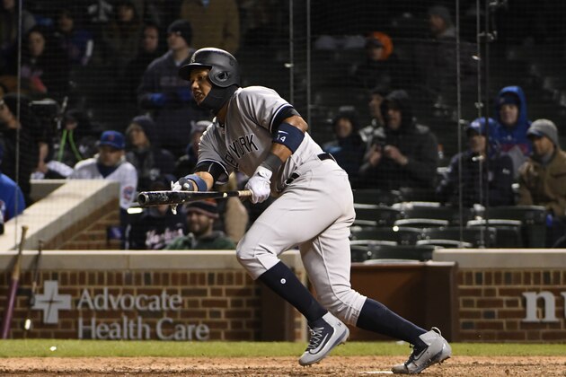 CHICAGO, IL - MAY 08: Starlin Castro #14 of the New York Yankees drives in the go ahead run against the Chicago Cubs during the eighteenth inning on May 8, 2017 at Wrigley Field  in Chicago, Illinois. (Photo by David Banks/Getty Images)