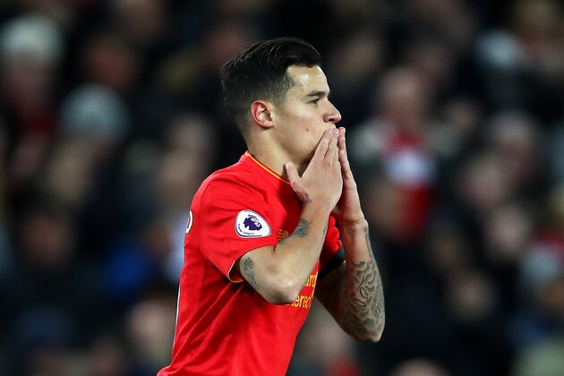 LIVERPOOL, ENGLAND - APRIL 05:  Philippe Coutinho of Liverpool celebrates scoring his sides first goal during the Premier League match between Liverpool and AFC Bournemouth at Anfield on April 5, 2017 in Liverpool, England.  (Photo by Clive Brunskill/Getty Images)