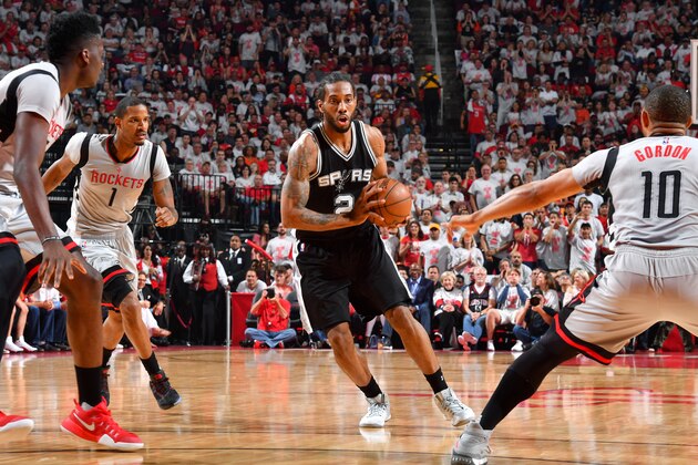 HOUSTON, TX - MAY 7: Kawhi Leonard #2 of the San Antonio Spurs handles the ball during the game against the Houston Rockets during Game Four of the Western Conference Semifinals of the 2017 Playoffs on May 7, 2017 at the Toyota Center in Houston, Texas. NOTE TO USER: User expressly acknowledges and agrees that, by downloading and or using this photograph, User is consenting to the terms and conditions of the Getty Images License Agreement. Mandatory Copyright Notice: Copyright 2017 NBAE (Photo by Jesse D. Garrabrant/NBAE via Getty Images)