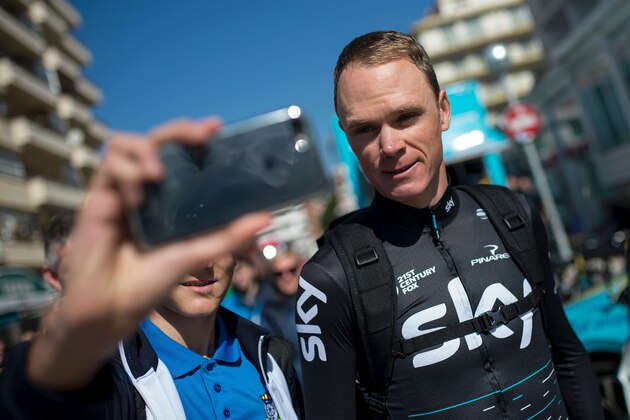Sky's British rider Christopher Froome poses for a selfie photo with a fan before the first stage of the 97th Volta Catalunya 2017, a 178,9 km ride starting and finishing in Calella, on March 20, 2017. / AFP PHOTO / Josep Lago        (Photo credit should read JOSEP LAGO/AFP/Getty Images)