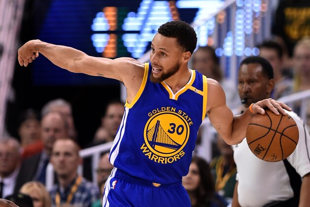 SALT LAKE CITY, UT - MAY 8: Stephen Curry #30 of the Golden State Warriors directs a play in the first half against the Utah Jazz in Game Four of the Western Conference Semifinals during the 2017 NBA Playoffs at Vivint Smart Home Arena on May 8, 2017 in Salt Lake City, Utah. NOTE TO USER: User expressly acknowledges and agrees that, by downloading and or using this photograph, User is consenting to the terms and conditions of the Getty Images License Agreement. (Photo by Gene Sweeney Jr/Getty Images)