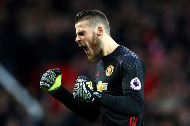 MANCHESTER, ENGLAND - DECEMBER 11:  David De Gea of Manchester United celebrates his team's first goal during the Premier League match between Manchester United and Tottenham Hotspur at Old Trafford on December 11, 2016 in Manchester, England.  (Photo by Clive Brunskill/Getty Images)