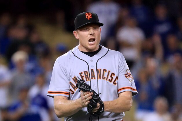 LOS ANGELES, CA - MAY 03:  Mark Melancon #41 of the San Francisco Giants celebrates the final Los Angeles Dodgers out for a 4-1 win during the 11th inning at Dodger Stadium on May 3, 2017 in Los Angeles, California.  (Photo by Harry How/Getty Images)