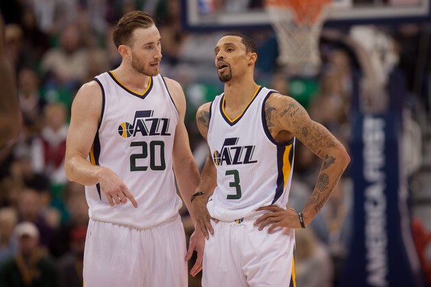 Utah Jazz's Gordon Hayward (20) and George Hill (3) chat on the court in the second half during an NBA basketball game against the Utah Jazz Saturday, Jan. 14, 2017, in Salt Lake City. The Jazz won the game 114-107. (AP Photo/Kim Raff)