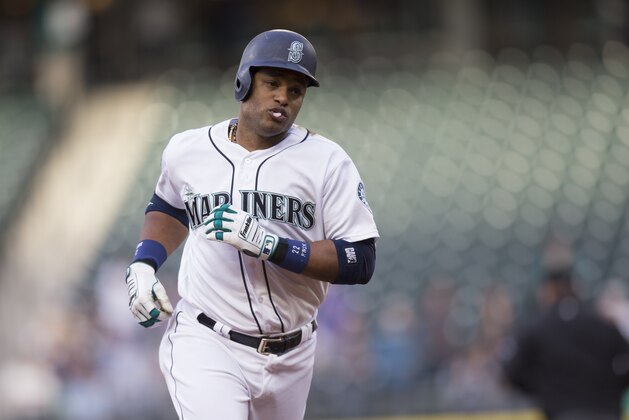 SEATTLE, WA - MAY 3: Robinson Cano #22 of the Seattle Mariners rounds the bases after hitting a solo home run off of starting pitcher Ricky Nolasco #47 of the Los Angeles Angels of Anaheim during the first inning of a game at Safeco Field on May 3, 2017 in Seattle, Washington. (Photo by Stephen Brashear/Getty Images)