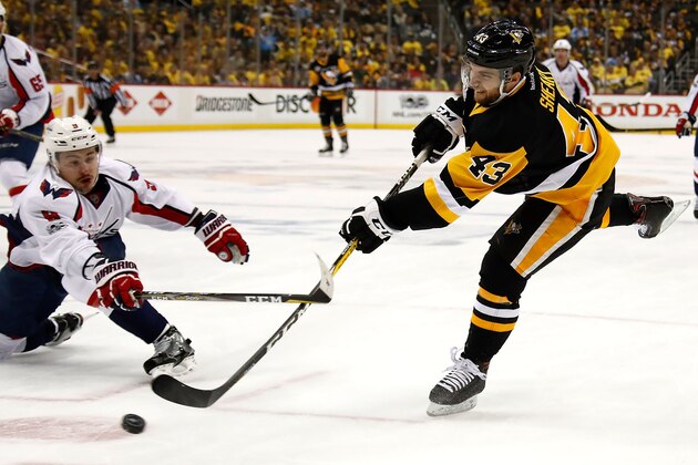 PITTSBURGH, PA - MAY 08:  Dmitry Orlov #9 of the Washington Capitals defends against Conor Sheary #43 of the Pittsburgh Penguins in Game Six of the Eastern Conference Second Round during the 2017 NHL Stanley Cup Playoffs at PPG PAINTS Arena on May 8, 2017 in Pittsburgh, Pennsylvania.  (Photo by Gregory Shamus/Getty Images)