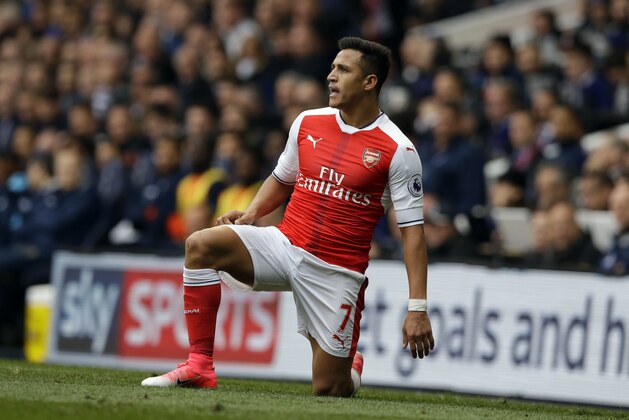 Arsenal's Alexis Sanchez looks on during the English Premier League soccer match between Tottenham Hotspur and Arsenal at White Hart Lane in London, Sunday, April 30, 2017. (AP Photo/Alastair Grant)