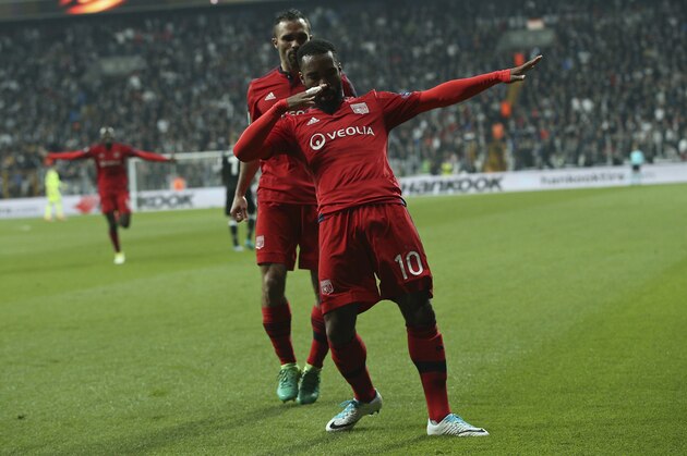 Lyon's Alexandre Lacazette, foreground celebrates scoring his side's 1st goal during a Europa League quarterfinal, second leg soccer match between Besiktas and Lyon in Istanbul, Turkey, Thursday April 20, 2017. (AP Photo/Emrah Gurel)