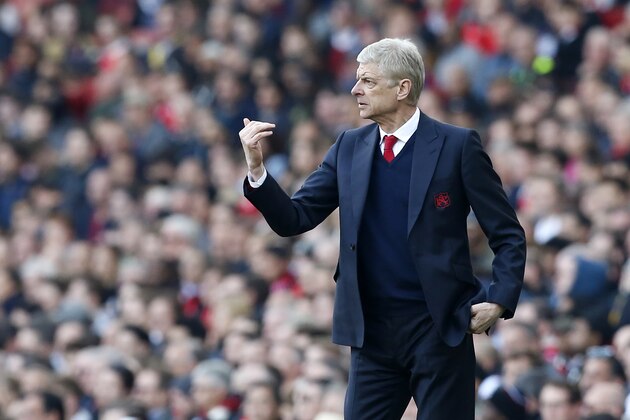 Arsenal's French manager Arsene Wenger gestures on the touchline during the English Premier League football match between Arsenal and Manchester United at the Emirates Stadium in London on May 7, 2017.  / AFP PHOTO / IKIMAGES / Ian KINGTON / RESTRICTED TO EDITORIAL USE. No use with unauthorized audio, video, data, fixture lists, club/league logos or 'live' services. Online in-match use limited to 45 images, no video emulation. No use in betting, games or single club/league/player publications.  /         (Photo credit should read IAN KINGTON/AFP/Getty Images)