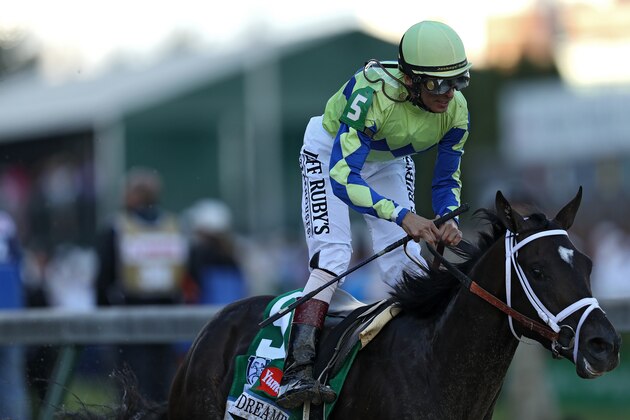 LOUISVILLE, KY - MAY 06: Jockey John Velazquez celebrates atop Always Dreaming #5 as they cross the finish line after winning the 143rd running of the Kentucky Derby at Churchill Downs on May 6, 2017 in Louisville, Kentucky. (Photo by Patrick Smith/Getty Images)