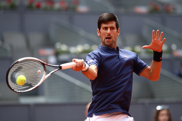 MADRID, SPAIN - MAY 10:  Novak Djokovic of Serbia plays a forehand in his match against Nicolas Almagro of Spain during day five of the Mutua Madrid Open tennis at La Caja Magica on May 10, 2017 in Madrid, Spain.  (Photo by Julian Finney/Getty Images)