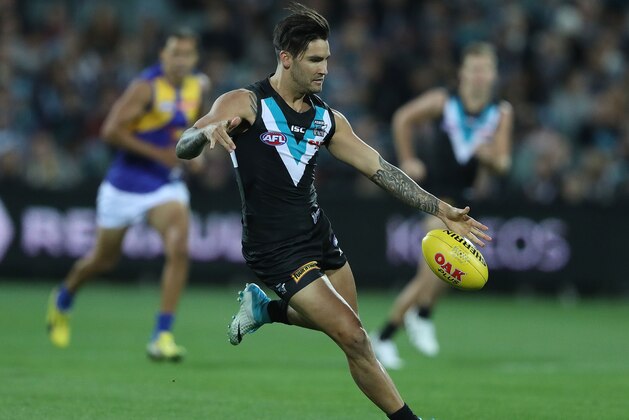 ADELAIDE, AUSTRALIA - MAY 06: Chad Wingard of the Power kicks the ball during the round seven AFL match between the Port Adelaide Power and the West Coast Eagles at Adelaide Oval on May 6, 2017 in Adelaide, Australia.  (Photo by Robert Cianflone/Getty Images)