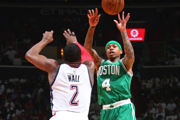 WASHINGTON, DC - MAY 7:  Isaiah Thomas #4 of the Boston Celtics shoots the ball over John Wall #2 of the Washington Wizards in Game Four of the Eastern Conference Semifinals during the 2017 NBA Playoffs on May 7, 2017 at Verizon Center in Washigton, DC. NOTE TO USER: User expressly acknowledges and agrees that, by downloading and or using this Photograph, user is consenting to the terms and conditions of the Getty Images License Agreement. Mandatory Copyright Notice: Copyright 2017 NBAE (Photo by Ned Dishman/NBAE via Getty Images)