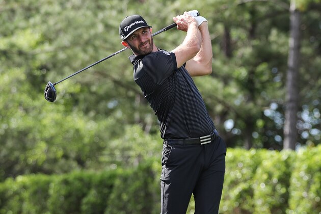 May 5, 2017; Wilmington, NC, USA; Dustin Johnson hits his tee shot on the fourth hole during the second round of the Wells Fargo Championship golf tournament  at Eagle Point Golf Club. Mandatory Credit: Jim Dedmon-USA TODAY Sports