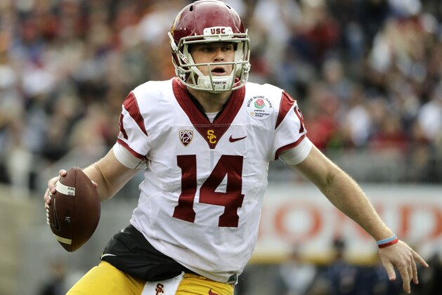 FILE - In this Jan. 2, 2017, file photo, Southern California quarterback Sam Darnold looks to pass against Penn State during the Rose Bowl NCAA college football game in Pasadena, Calif. USC has a quarterback i Darnold who looks like a Heisman Trophy contender and will enter the season riding a nine-game winning streak. (AP Photo/Jae C. Hong, File)