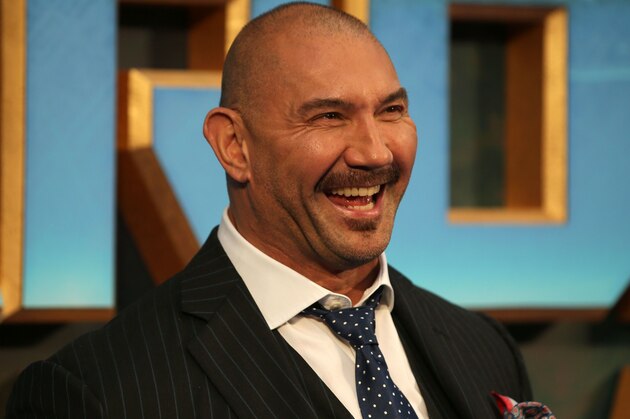 US actor Dave Bautista reacts as he poses for a photograph upon arrival at the European Gala screening of 'Guardians of the Galaxy Vol. 2' in London on April 24, 2017.  / AFP PHOTO / Daniel LEAL-OLIVAS        (Photo credit should read DANIEL LEAL-OLIVAS/AFP/Getty Images)