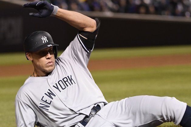 CHICAGO, IL - MAY 07: Aaron Judge #99 of the New York Yankees slides into third base with a RBI triple against the Chicago Cubs during the seventh inning on May 7, 2017 at Wrigley Field  in Chicago, Illinois. (Photo by David Banks/Getty Images)
