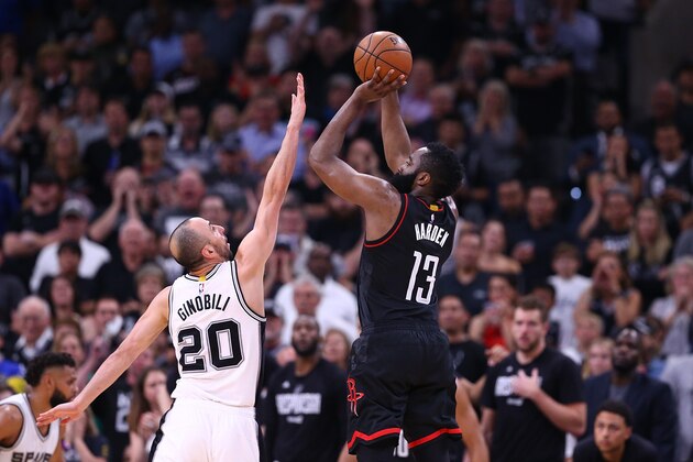 SAN ANTONIO, TX - MAY 09:  James Harden #13 of the Houston Rockets takes a shot against Manu Ginobili #20 of the San Antonio Spurs during Game Five of the Western Conference Semi-Finals at AT&T Center on May 9, 2017 in San Antonio, Texas.  NOTE TO USER: User expressly acknowledges and agrees that, by downloading and or using this photograph, User is consenting to the terms and conditions of the Getty Images License Agreement.  (Photo by Ronald Martinez/Getty Images)