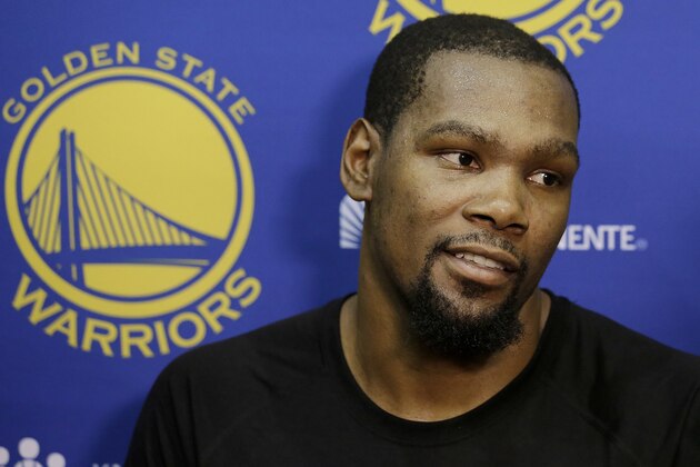 Golden State Warriors forward Kevin Durant speaks during NBA basketball practice in Oakland, Calif., Friday, April 7, 2017. (AP Photo/Jeff Chiu)