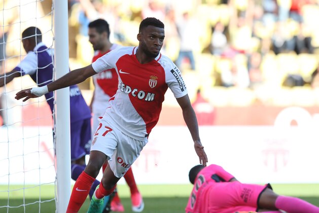 Monaco's French midfielder Thomas Lemar celebrates after scoring a goal during the French L1 football match Monaco (ASM) vs Toulouse (TFC) on April 29, 2017 at the 'Louis II Stadium' in Monaco. / AFP PHOTO / VALERY HACHE        (Photo credit should read VALERY HACHE/AFP/Getty Images)