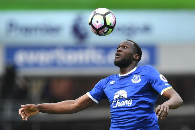 Everton's Belgian striker Romelu Lukaku heads the ball during the English Premier League football match between Everton and Chelsea at Goodison Park in Liverpool, north west England on April 30, 2017. / AFP PHOTO / Paul ELLIS / RESTRICTED TO EDITORIAL USE. No use with unauthorized audio, video, data, fixture lists, club/league logos or 'live' services. Online in-match use limited to 75 images, no video emulation. No use in betting, games or single club/league/player publications.  /         (Photo credit should read PAUL ELLIS/AFP/Getty Images)