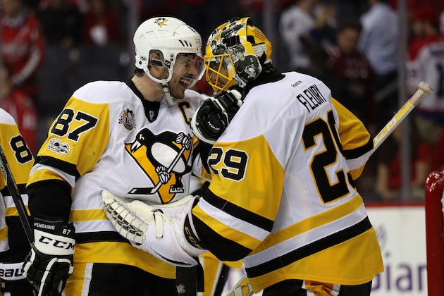 WASHINGTON, DC - MAY 10: Sidney Crosby #87 and goalie Marc-Andre Fleury #29 of the Pittsburgh Penguins celebrate following the Penguins 2-0 win over the Washington Capitals in Game Seven of the Eastern Conference Second Round during the 2017 NHL Stanley Cup Playoffs at Verizon Center on May 10, 2017 in Washington, DC.  (Photo by Patrick Smith/Getty Images)