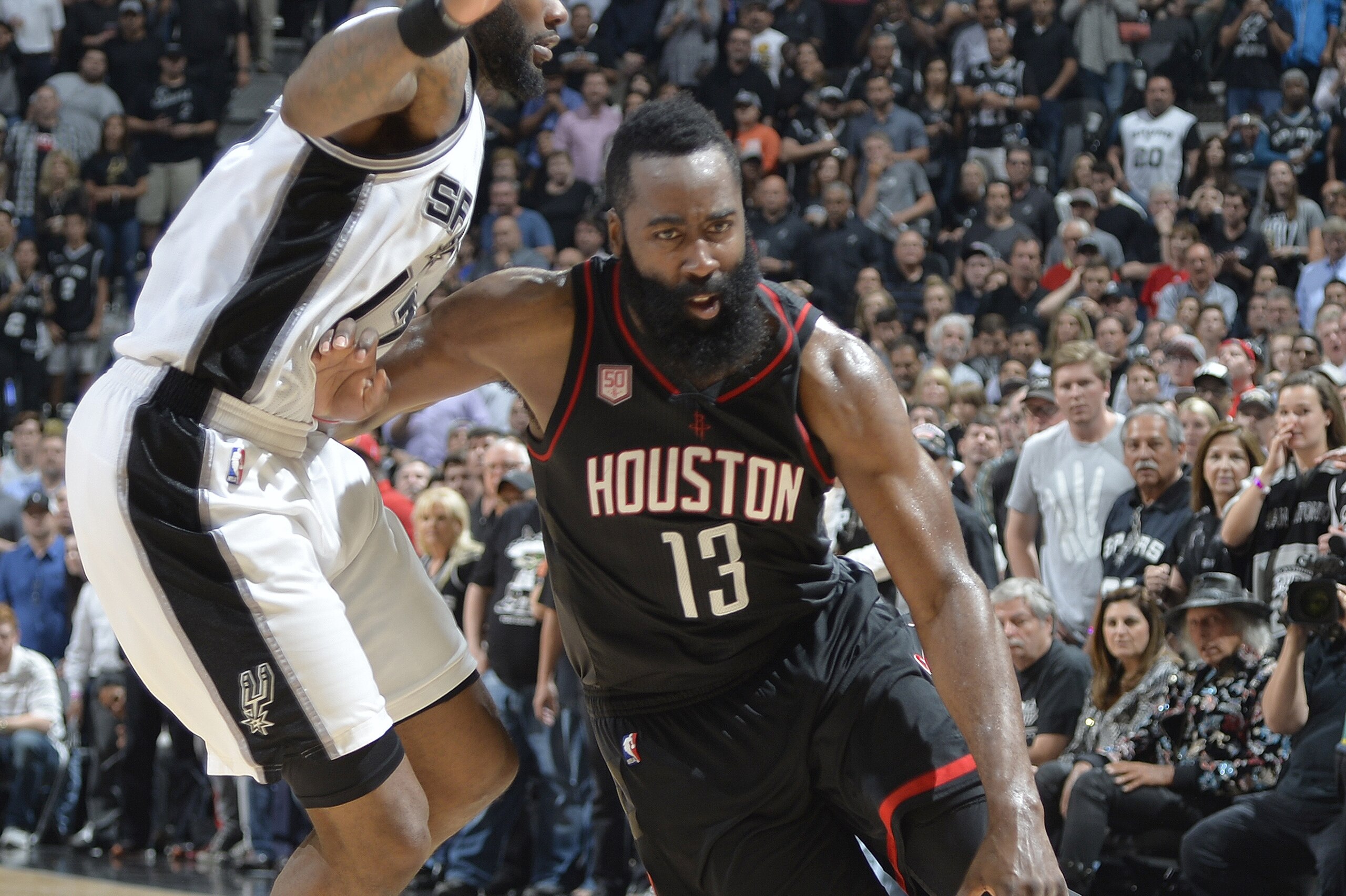 SAN ANTONIO, TX - MAY 9: James Harden #13 of the Houston Rockets handles the ball against the San Antonio Spurs in Game Five of the Western Conference Semifinals on May 9, 2017 at the AT&T Center in San Antonio, Texas. NOTE TO USER: User expressly acknowledges and agrees that, by downloading and or using this photograph, user is consenting to the terms and conditions of the Getty Images License Agreement. Mandatory Copyright Notice: Copyright 2017 NBAE (Photos by Mark Sobhani/NBAE via Getty Images)