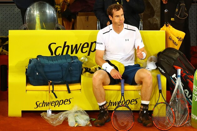 MADRID, SPAIN - MAY 11:  Andy Murray of Great Britain gives a thumbs up to his coaching staff during his match against Borna Coric of Croatia during day six of the Mutua Madrid Open tennis at La Caja Magica on May 11, 2017 in Madrid, Spain.  (Photo by Clive Rose/Getty Images)
