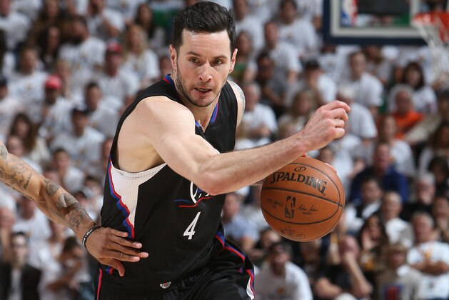 SALT LAKE CITY, UT - APRIL 23: J.J. Redick #4 of the LA Clippers handles the ball against the Utah Jazz during Game Four of the Western Conference Quarterfinals of the 2017 NBA Playoffs on April 23, 2017 at vivint.SmartHome Arena in Salt Lake City, Utah. NOTE TO USER: User expressly acknowledges and agrees that, by downloading and or using this Photograph, User is consenting to the terms and conditions of the Getty Images License Agreement. Mandatory Copyright Notice: Copyright 2017 NBAE (Photo by Melissa Majchrzak/NBAE via Getty Images)