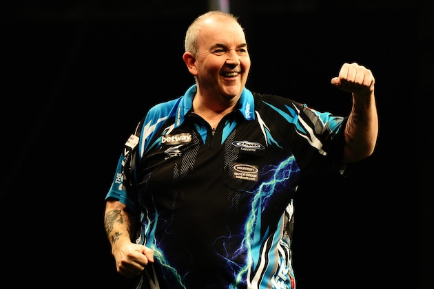 EXETER, UNITED KINGDOM - MARCH 02: Phil Taylor celebrates during Night Five of the Betway Premier League Darts at Westpoint Arena on March 2, 2017 in Exeter, England. (Photo by Harry Trump/Getty Images)