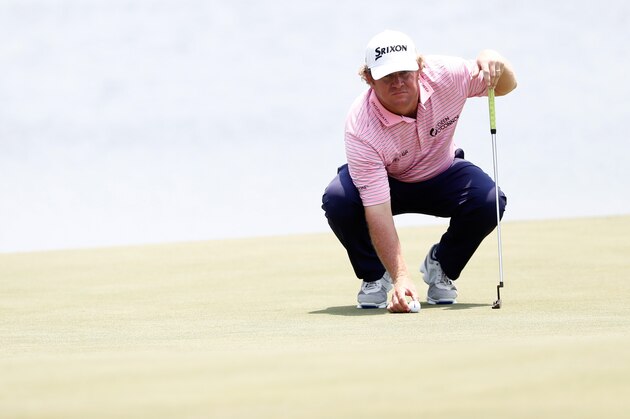 PONTE VEDRA BEACH, FL - MAY 11:  William McGirt of the United States lines up a putt on the 18th green during the first round of the THE PLAYERS Championship at the Stadium course at TPC Sawgrass on May 11, 2017 in Ponte Vedra Beach, Florida.  (Photo by Sam Greenwood/Getty Images)