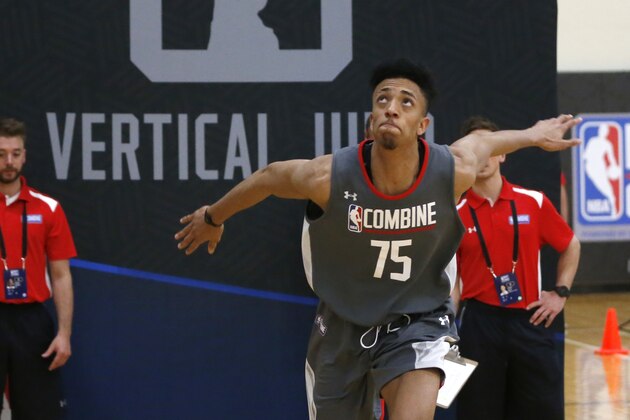 Jonathan Jeanne, from France, participates in the running vertical jump at the NBA basketball draft combine Thursday, May 11, 2017, in Chicago. (AP Photo/Charles Rex Arbogast)