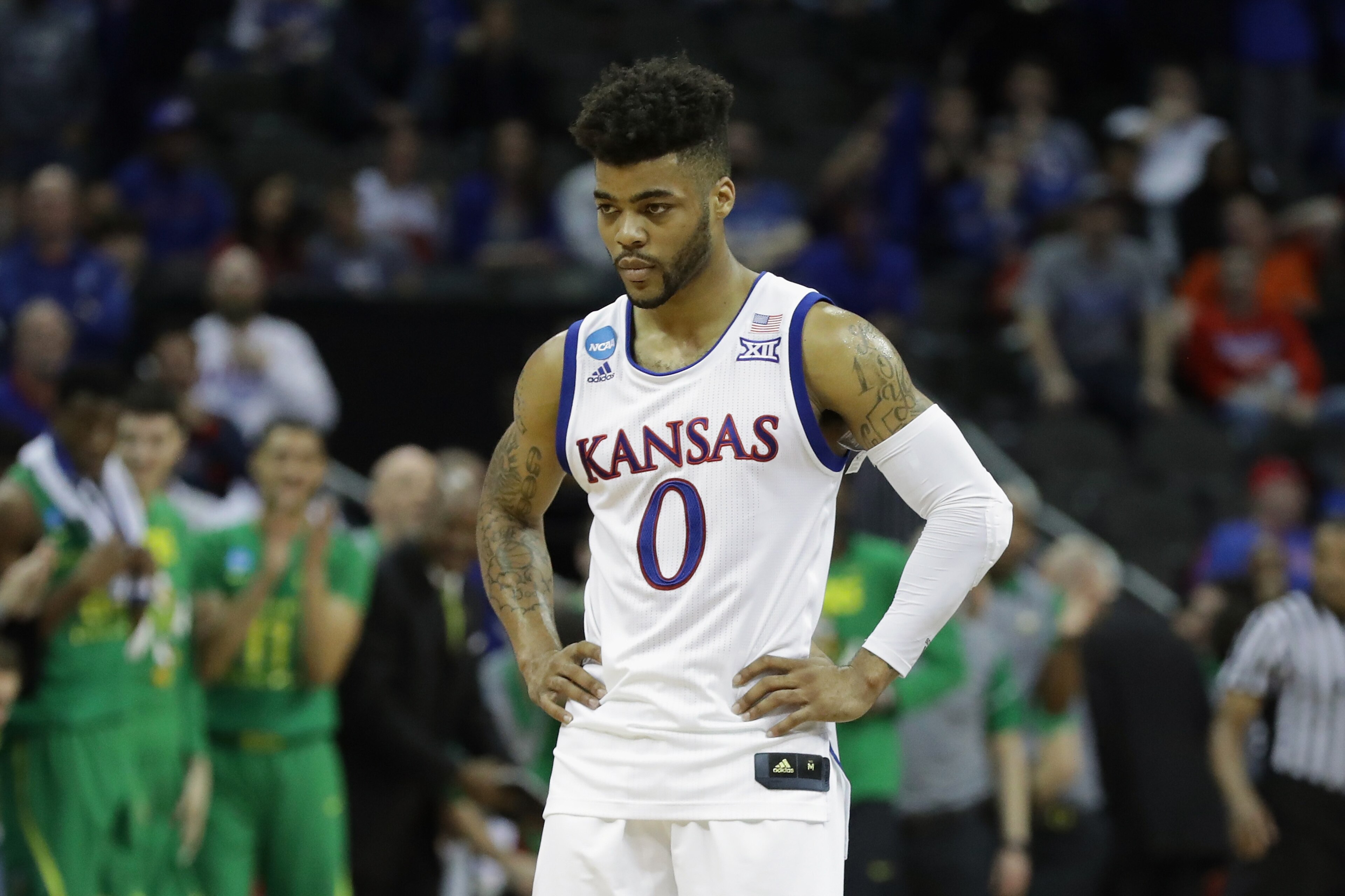 KANSAS CITY, MO - MARCH 25:  Frank Mason III #0 of the Kansas Jayhawks reacts in the second half against the Oregon Ducks during the 2017 NCAA Men's Basketball Tournament Midwest Regional at Sprint Center on March 25, 2017 in Kansas City, Missouri.  (Photo by Ronald Martinez/Getty Images)