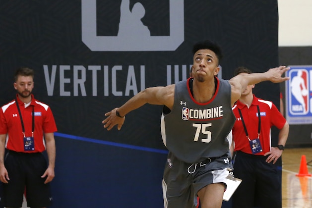 Jonathan Jeanne, from France, participates in the running vertical jump at the NBA basketball draft combine Thursday, May 11, 2017, in Chicago. (AP Photo/Charles Rex Arbogast)