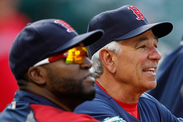 BALTIMORE, MD - MAY 22:  Manager Bobby Valentine (R) and David Ortiz #34 of the Boston Red Sox look on during batting practice before the start of the Red Sox game against the Baltimore Orioles at Oriole Park at Camden Yards on May 22, 2012 in Baltimore, Maryland.  (Photo by Rob Carr/Getty Images)