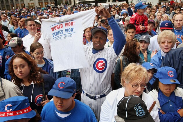 CHICAGO - OCTOBER 01:  One of the Chicago Cubs' most famous fans Ronnie Woo-Woo Wickers (C) celebrates the team making it into the playoffs with other fans at a lunch-time rally downtown October 1, 2007 in Chicago, Illinois. This is the first time the Cubs have been in the playoffs since 2003. They haven't been in the World Series since 1945 and haven't won a Series since 1908.  (Photo by Scott Olson/Getty Images)