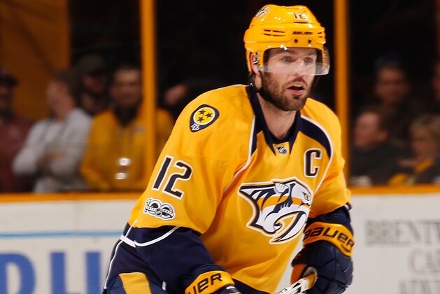NASHVILLE, TN - FEBRUARY 04:  Mike Fisher #12 of the Nashville Predators skates against the Detroit Red Wings during the second period at Bridgestone Arena on February 4, 2017 in Nashville, Tennessee.  (Photo by Frederick Breedon/Getty Images)