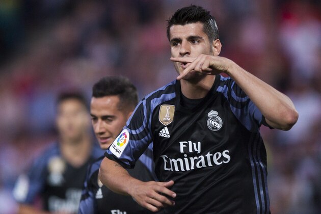 Real Madrid's Alvaro Morata celebrates scoring his goal against Granada during a Spanish La Liga soccer match between Granada and Real Madrid in Granada, Spain, Saturday May 6, 2017. (AP Photo/Daniel Tejedor)