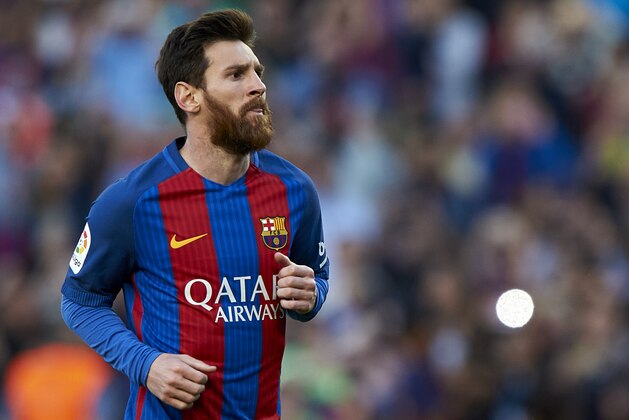 BARCELONA, SPAIN - MAY 06:  Lionel Messi of Barcelona celebrates after scoring the fourth goal during the La Liga match between FC Barcelona and Villarreal CF at Camp Nou Stadium on May 6, 2017 in Barcelona, Spain.  (Photo by fotopress/Getty Images)