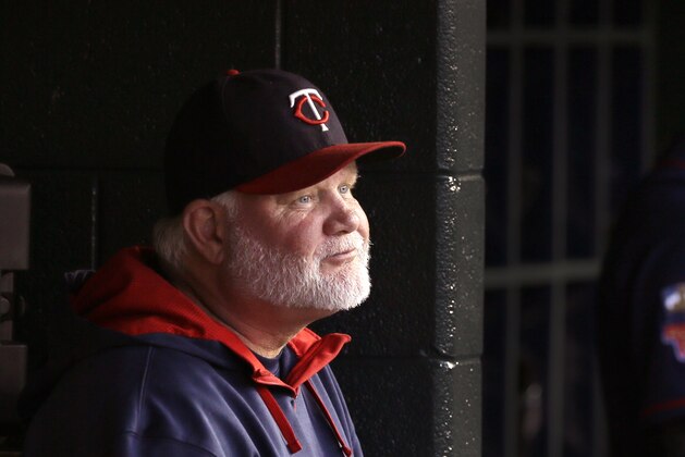 FILE - In this Saturday, Sept. 27, 2014, file photo, Minnesota Twins manager Ron Gardenhire sits in the dugout during the first inning of a baseball game against the Detroit Tigers in Detroit. The Twins fired Gardenhire on Monday, Sept. 29, 2014,  after 13 seasons that included at least 92 losses in each of the last four years. (AP Photo/Carlos Osorio, File)