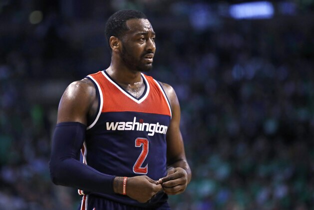 Washington Wizards guard John Wall reacts after a foul during the second quarter in Game 5 of the team's second-round NBA basketball playoff series against the Boston Celtics in Boston, Wednesday, May 10, 2017. The Celtics won 123-101. (AP Photo/Charles Krupa)