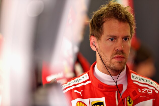 MONTMELO, SPAIN - MAY 12:  Sebastian Vettel of Germany and Ferrari in the garage during practice for the Spanish Formula One Grand Prix at Circuit de Catalunya on May 12, 2017 in Montmelo, Spain.  (Photo by Mark Thompson/Getty Images)