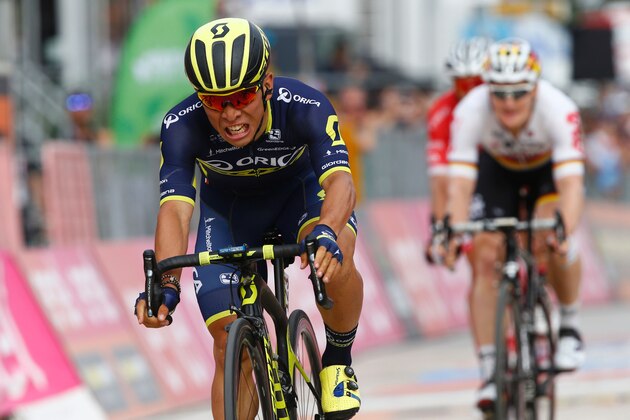 Australia's Caleb Ewan of the Orica team celebrates after crossing the finish line to win the 7th stage of the 100th Giro d'Italia, Tour of Italy, cycling race from Castrovillari to Alberobello on May 12, 2017.  / AFP PHOTO / Luk BENIES        (Photo credit should read LUK BENIES/AFP/Getty Images)
