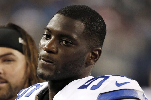 FILE - In this Aug. 28, 2014, file photo, Dallas Cowboys linebacker Rolando McClain watches from the sidelines during the fist half of an NFL preseason football game against the Denver Broncos in Arlington, Texas. A person with knowledge of the situation says McClain has been suspended for the first 10 games next season for his second violation of the NFL’s substance-abuse policy in as many years.  (AP Photo/Brandon Wade, File)