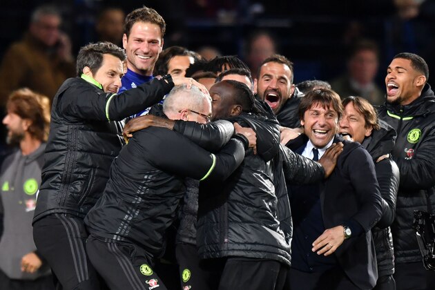 Chelsea's Italian head coach Antonio Conte (3R) leads celebrations of Chelsea's Belgian striker Michy Batshuayi scoring the opening goal during the English Premier League match between West Bromwich Albion and Chelsea at The Hawthorns stadium in West Bromwich, west Midlands on May 12, 2017. / AFP PHOTO / Anthony Devlin        (Photo credit should read ANTHONY DEVLIN/AFP/Getty Images)