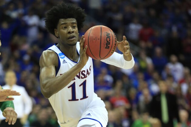Kansas guard Josh Jackson drives to the basket during the second half of a regional final against Oregon in the NCAA men's college basketball tournament, Saturday, March 25, 2017, in Kansas City, Mo. (AP Photo/Orlin Wagner)