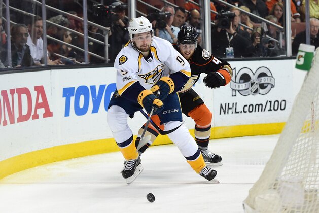 ANAHEIM, CA - MAY 12: Filip Forsberg #9 of the Nashville Predators plays the puck behind the net from Cam Fowler #4 of the Anaheim Ducks  in the second period of Game One of the Western Conference Final during the 2017 Stanley Cup Playoffs at Honda Center on May 12, 2017 in Anaheim, California.  (Photo by Harry How/Getty Images)