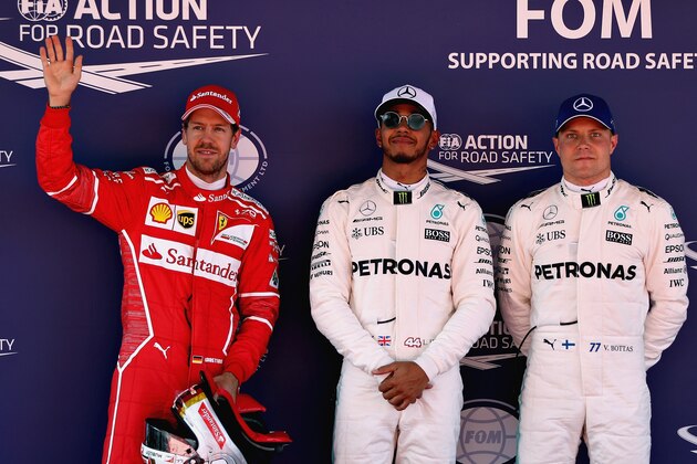 MONTMELO, SPAIN - MAY 13:  Top three qualifiers Lewis Hamilton of Great Britain and Mercedes GP, Sebastian Vettel of Germany and Ferrari and Valtteri Bottas of Finland and Mercedes GP in parc ferme during qualifying for the Spanish Formula One Grand Prix at Circuit de Catalunya on May 13, 2017 in Montmelo, Spain.  (Photo by Mark Thompson/Getty Images)