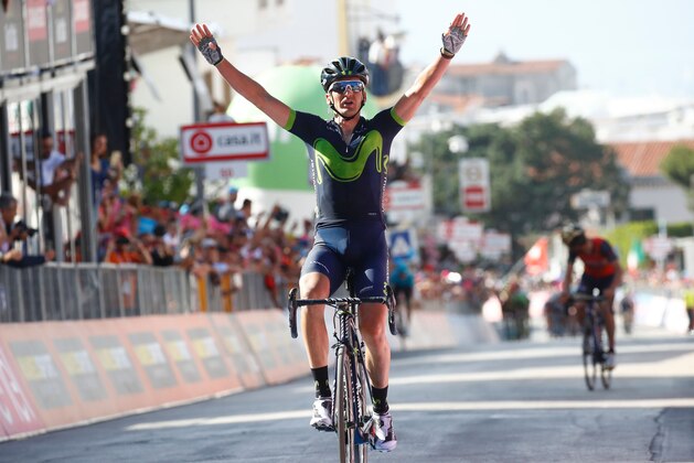 Spain's Gorka Izagirre of team Movistar celebrates as he crosses the finish line to win the 8th stage of the 100th Giro d'Italia, Tour of Italy, cycling race from Molfetta to Peschici on May 13, 2017.  / AFP PHOTO / Luk BENIES        (Photo credit should read LUK BENIES/AFP/Getty Images)